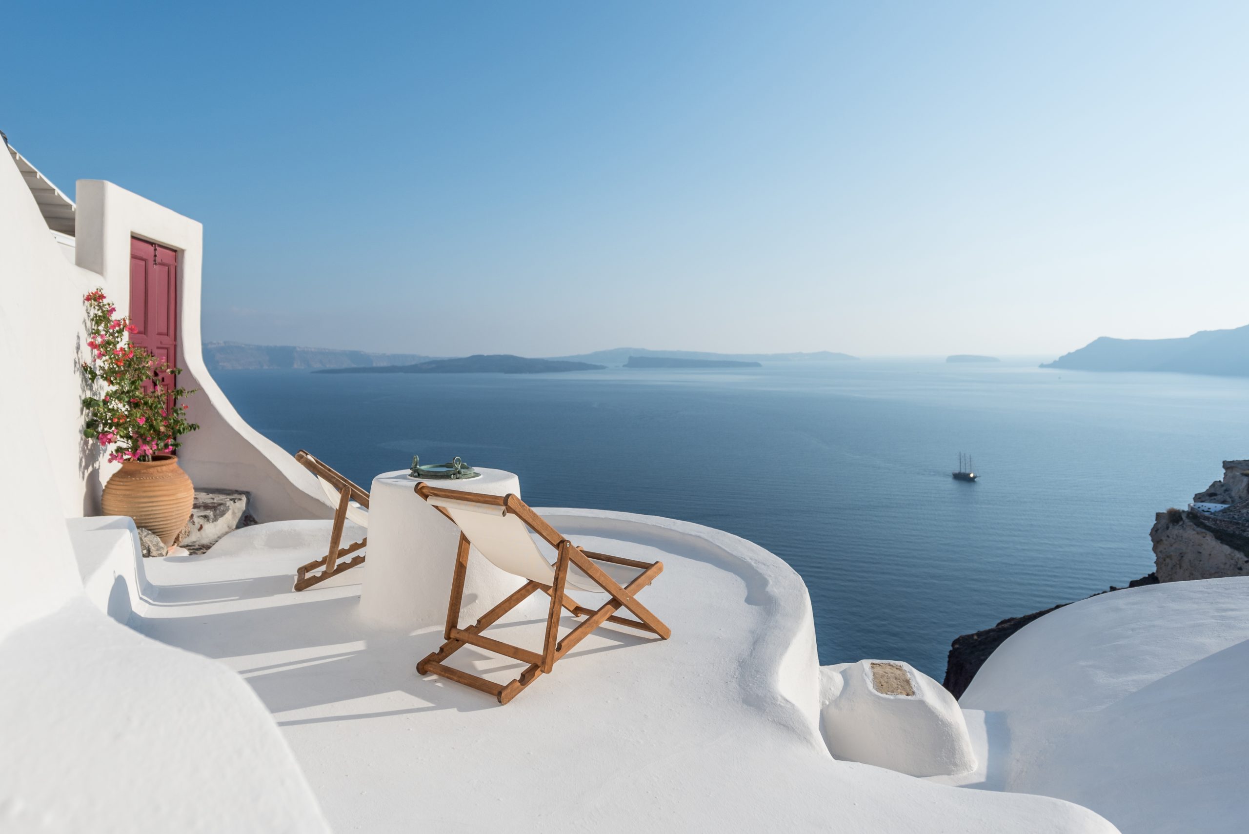 Terrace of cave with deckchair looking out at sea