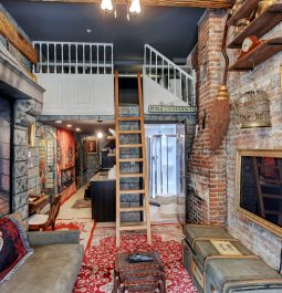 Harry Potter-Themed living room with stairs leading up to bedroom