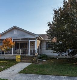 Exterior of home with yard