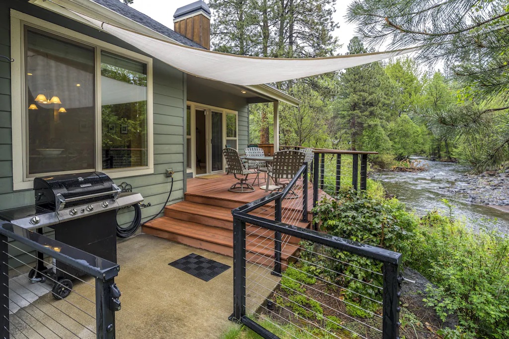 Modern Riverfront Home with Hot Tub & Fireplace