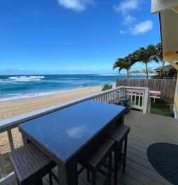 beachfront deck with seating