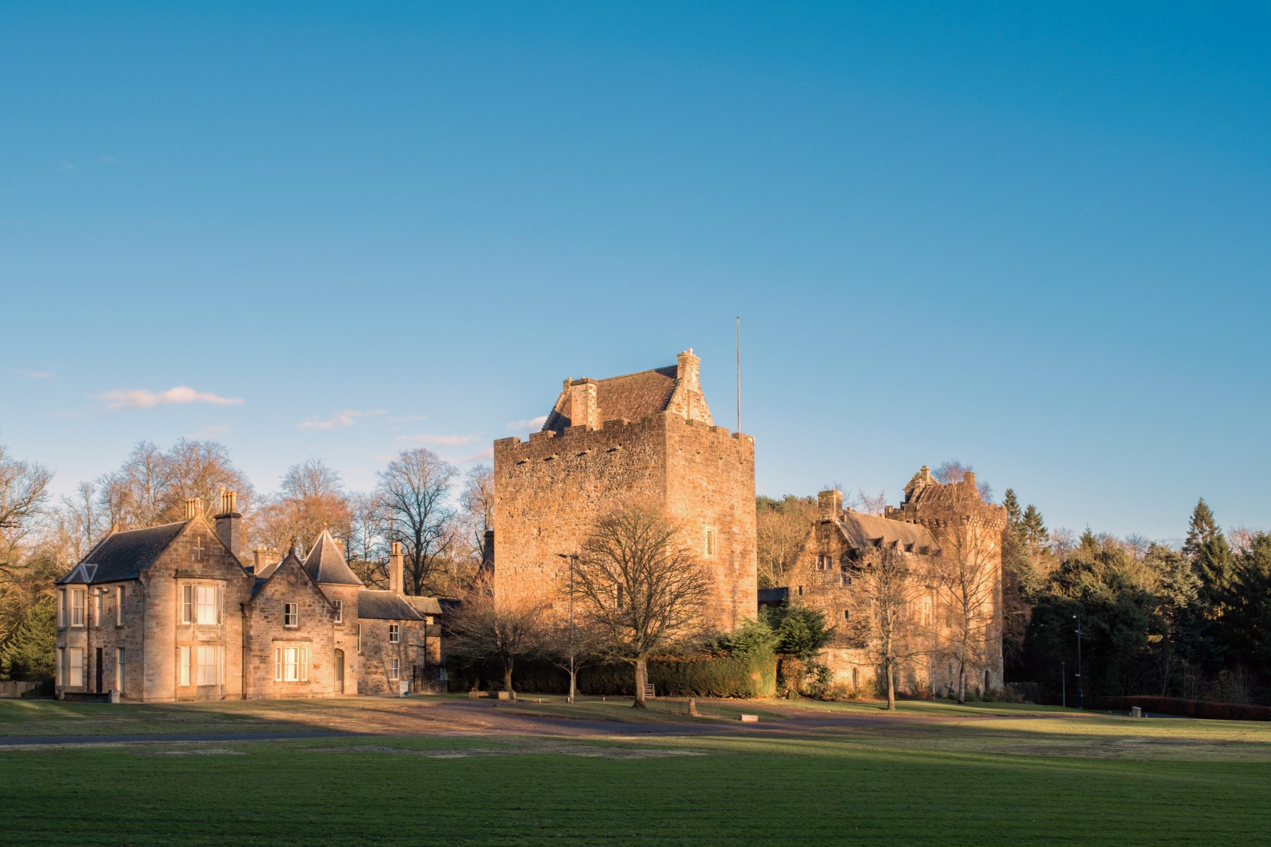 Majestic Buildings of Dean castle in Late Afternoon Sunlight in