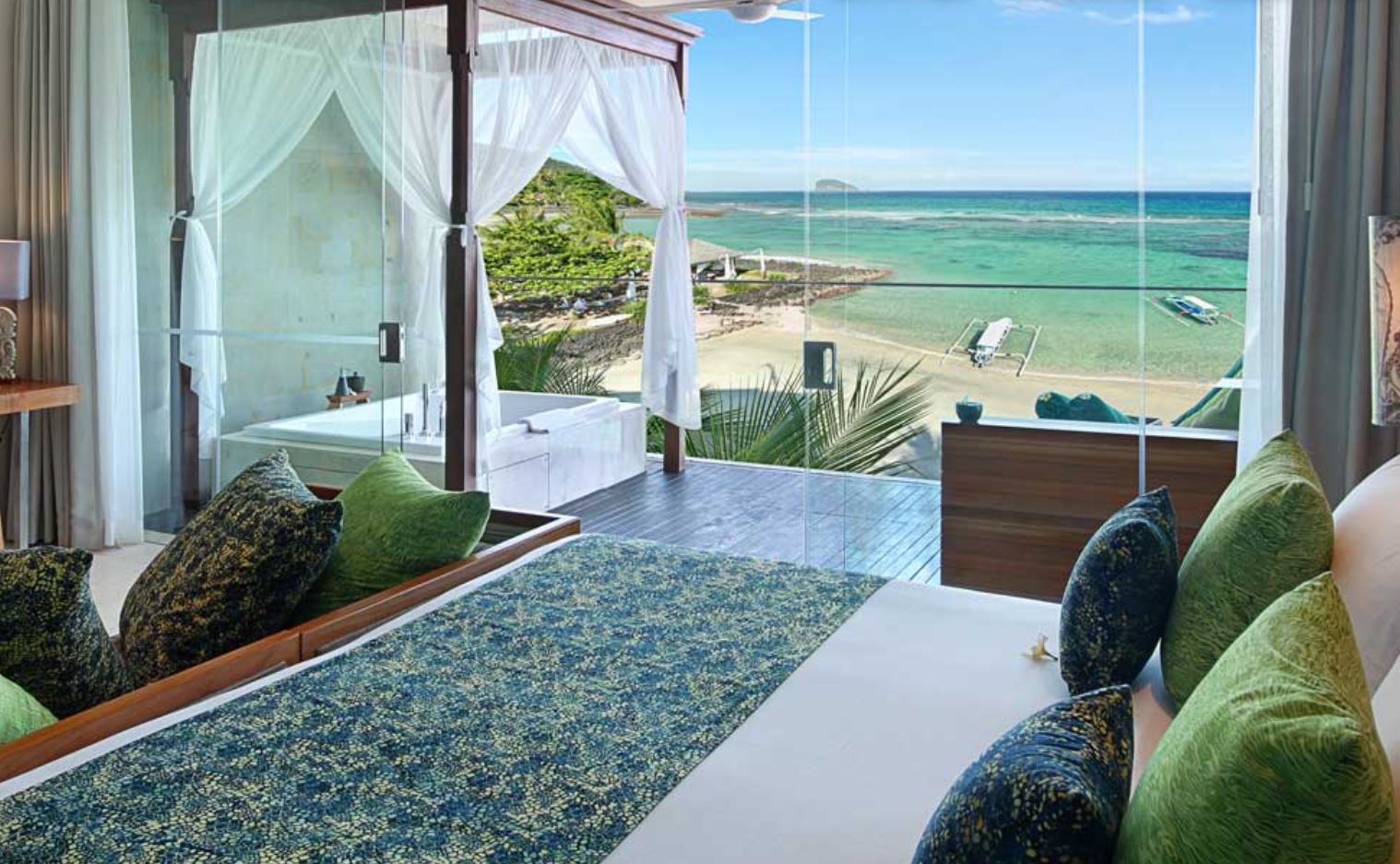 suite with a private Jacuzzi at Candi Beach Resort & Spa