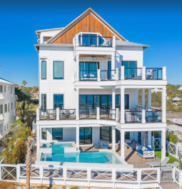 Multi-story home exterior with pool