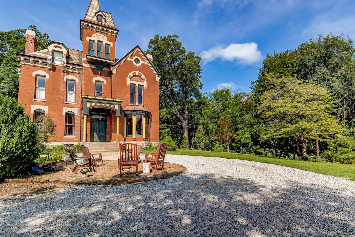 An Italianate mansion perched up on a hill