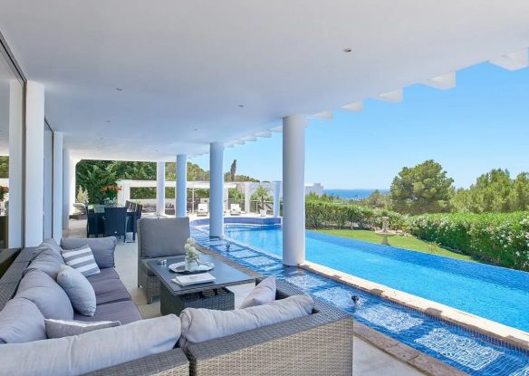 Villa terrace with a pool and a sea view