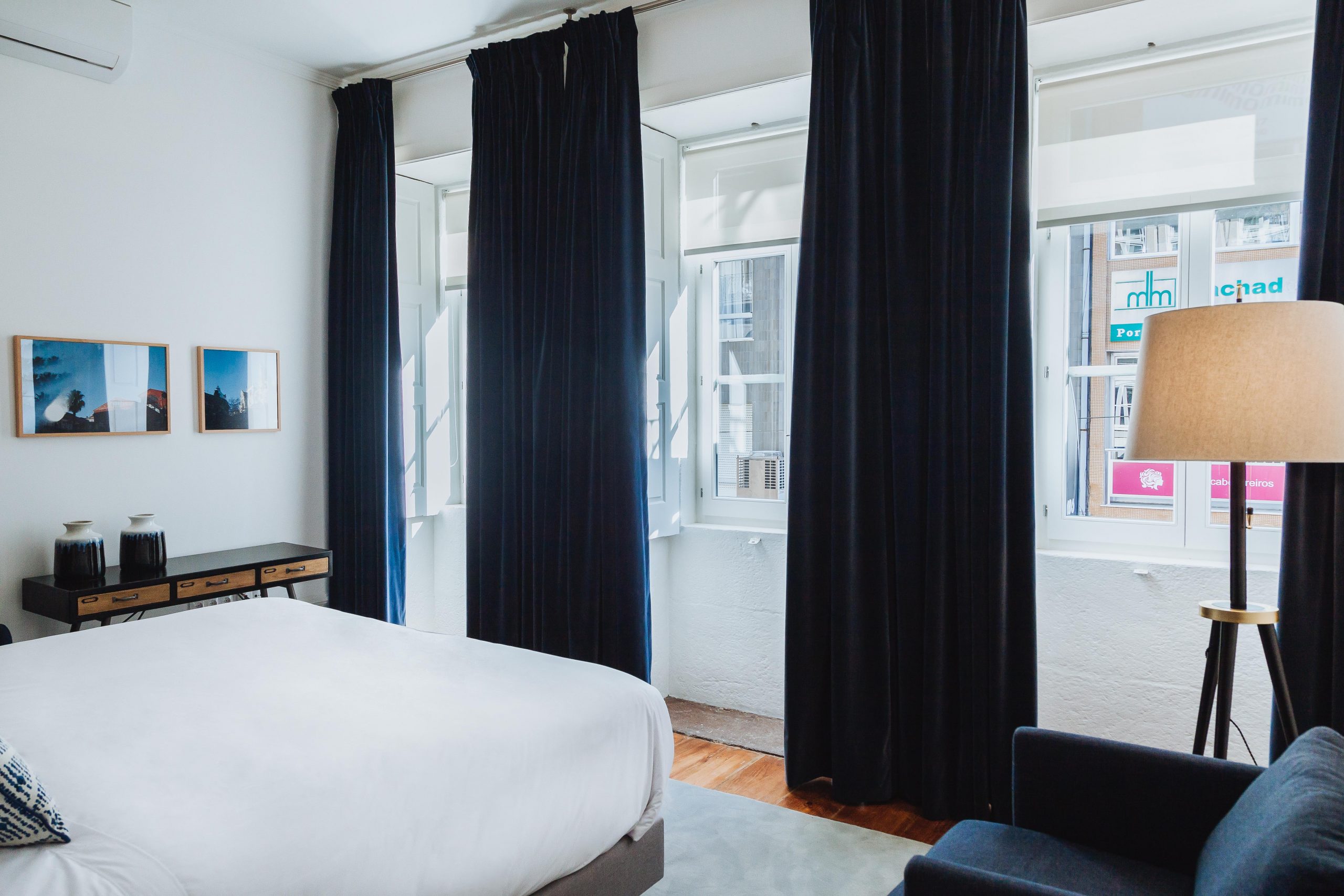 Monochrome bedroom with huge windows