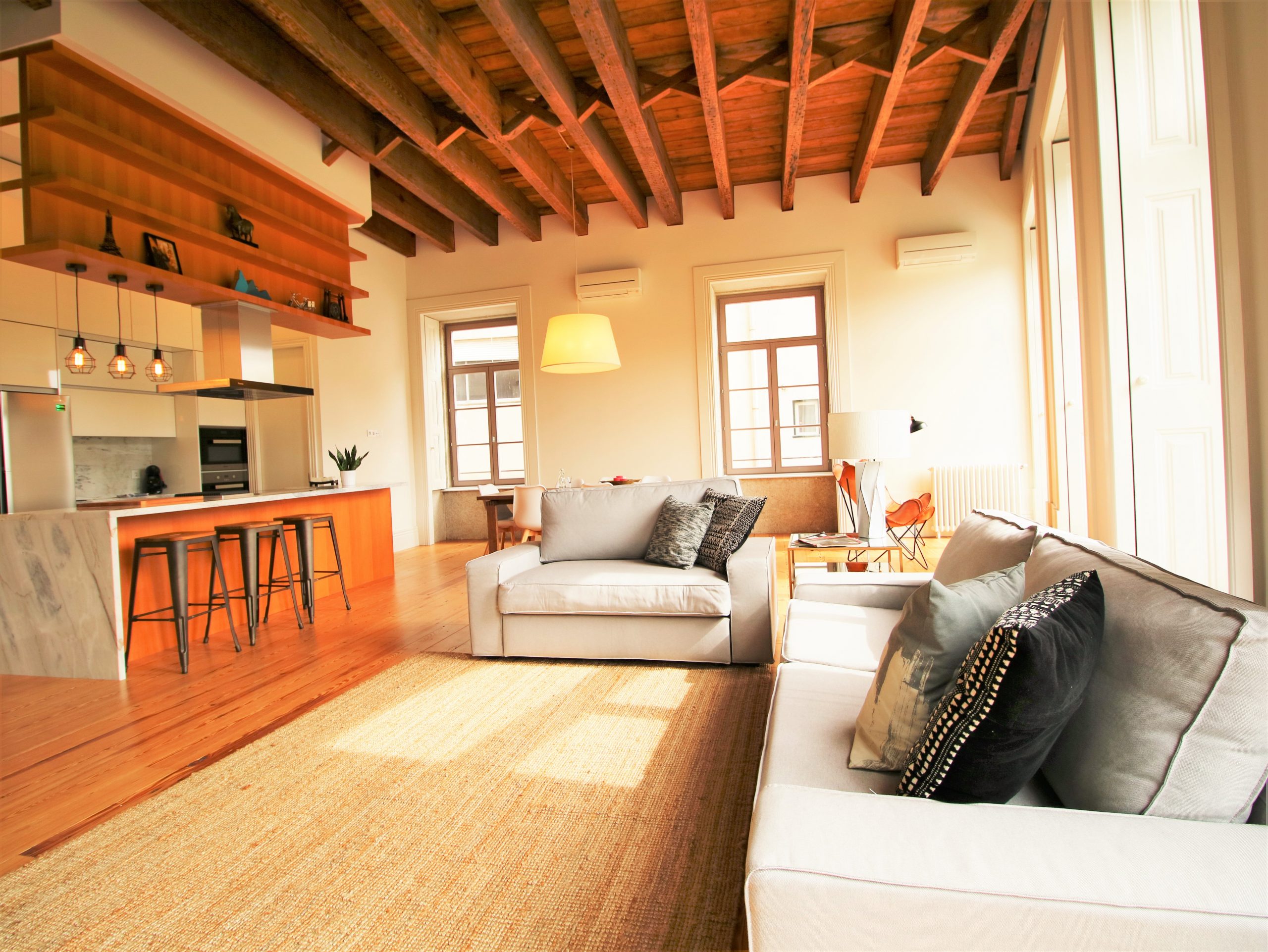 Wooden living room with dining table