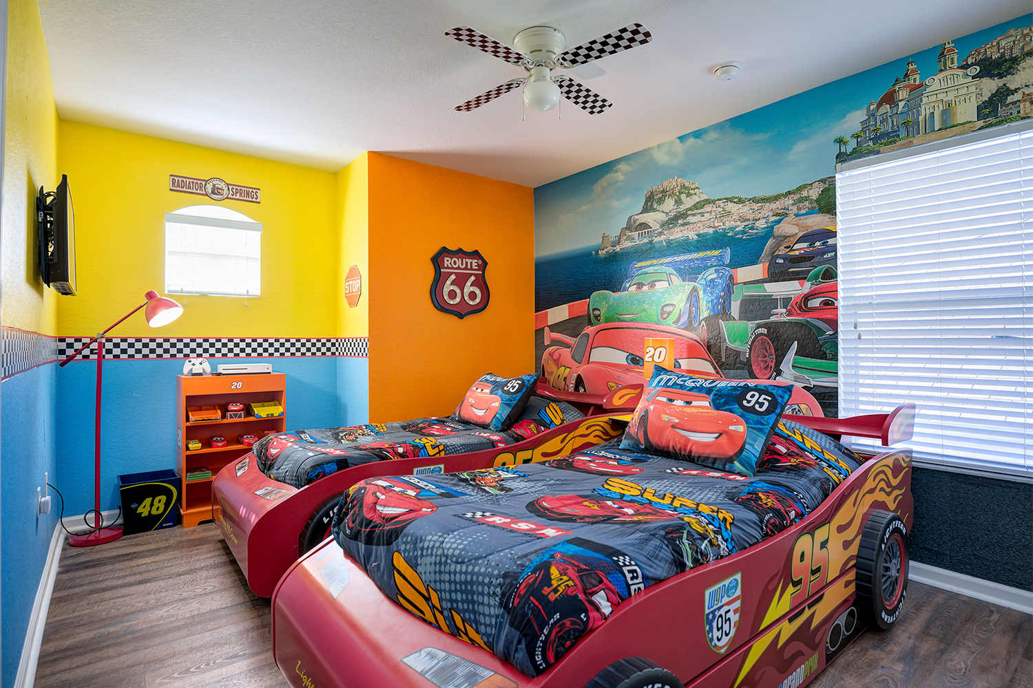 Cars themed bedroom with car shaped beds