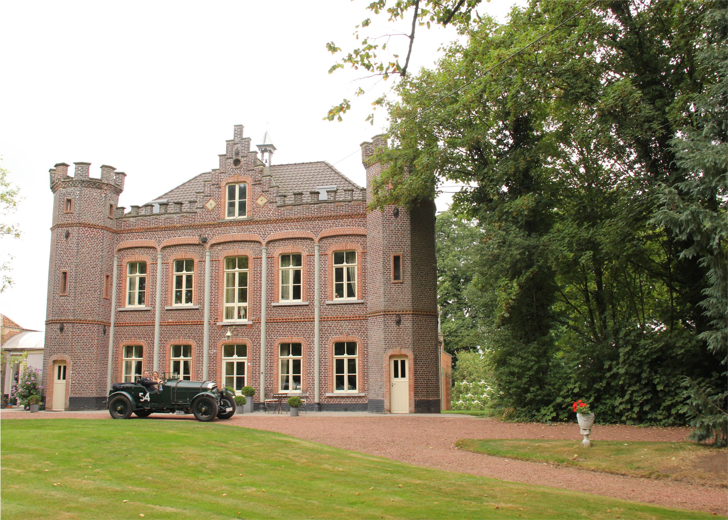 Huge castle complete with classic car