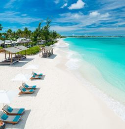 white sand beach with umbrellas at Beaches Turks and Caicos