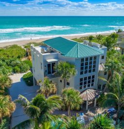 aerial view of beachfront home