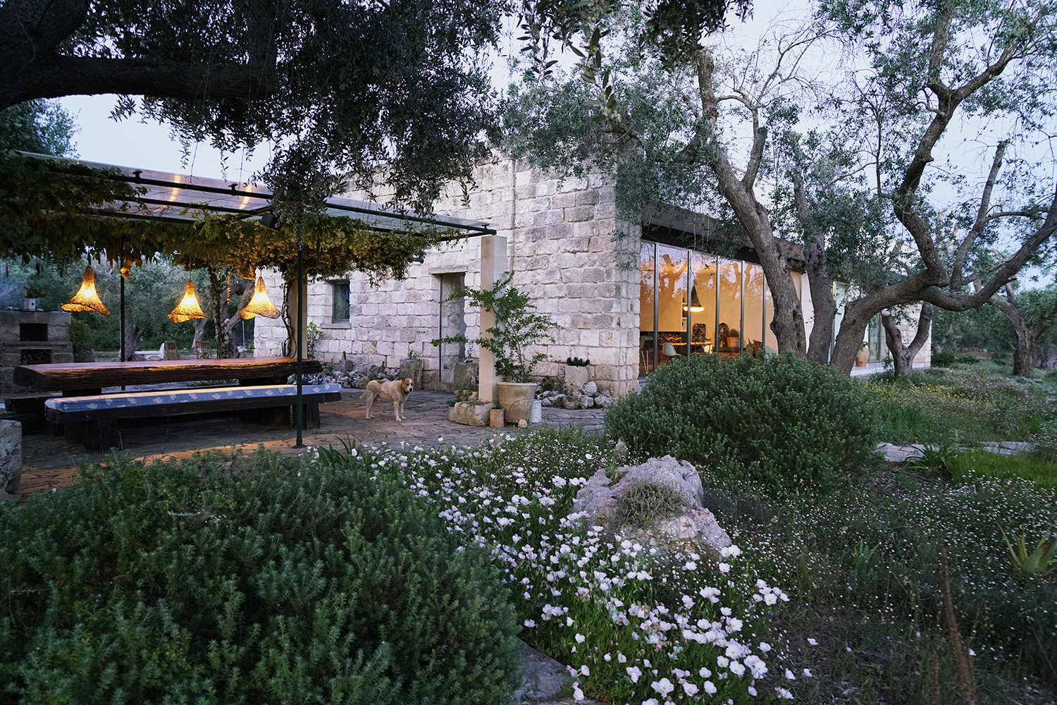 an elegant modern home inspired by Puglia's traditional architecture