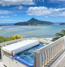 hot tub overlooking stunning water and island view