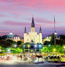 New Orleans night scene with carriages