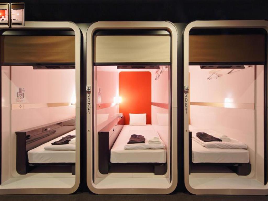 Inside view of individual capsules with beds and pull-down shutters