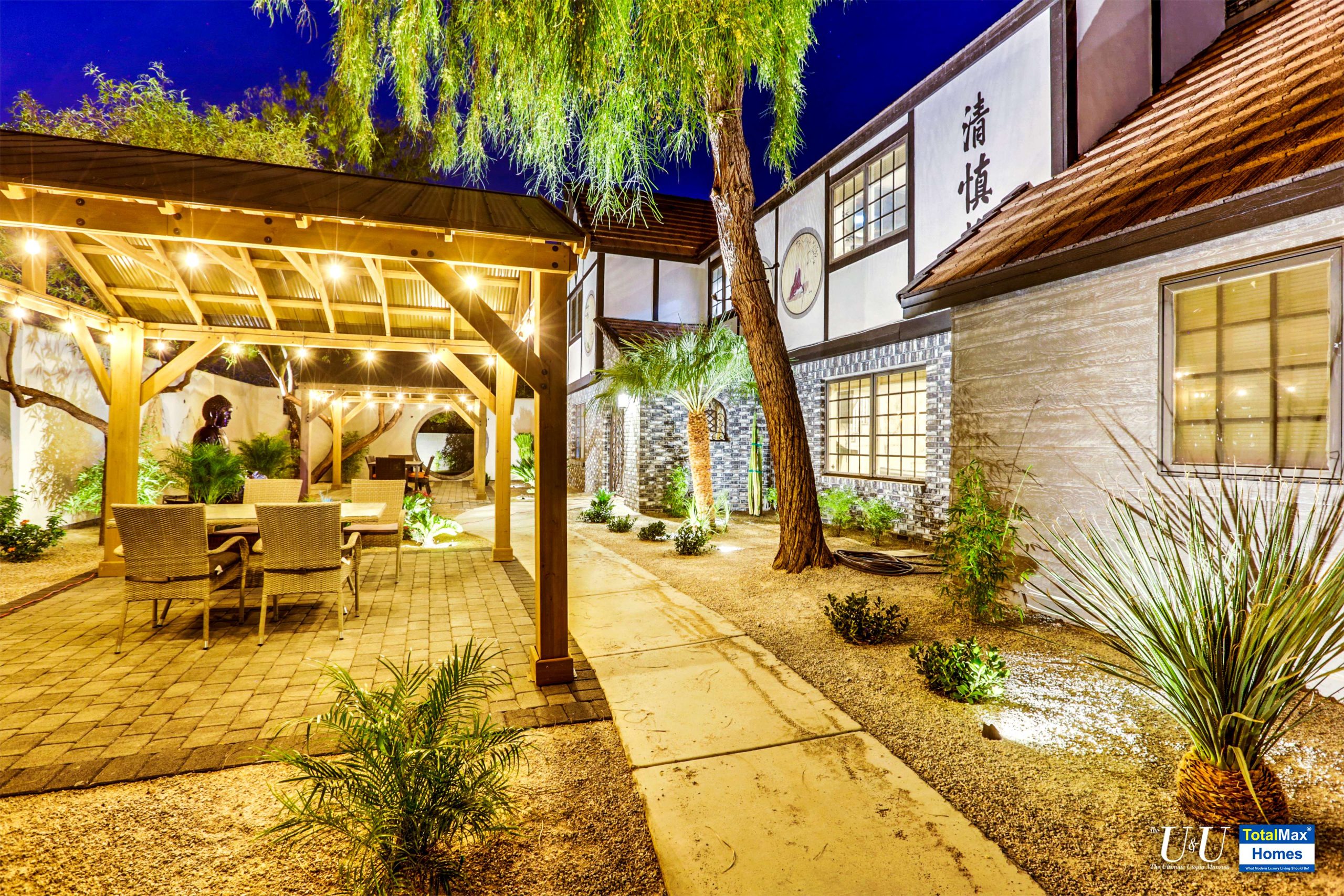 Outdoor terrace lit up under the night sky