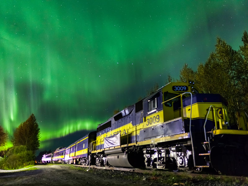 Alaska Railroad Winter Train beneath the aurora borealis