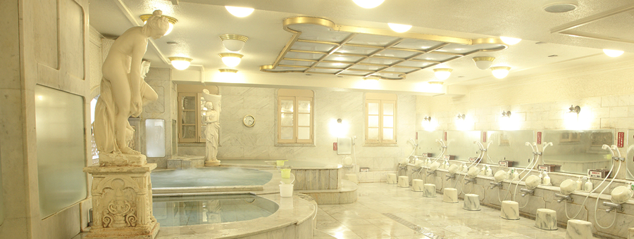 Stately, off-white spa area inside capsule hotel