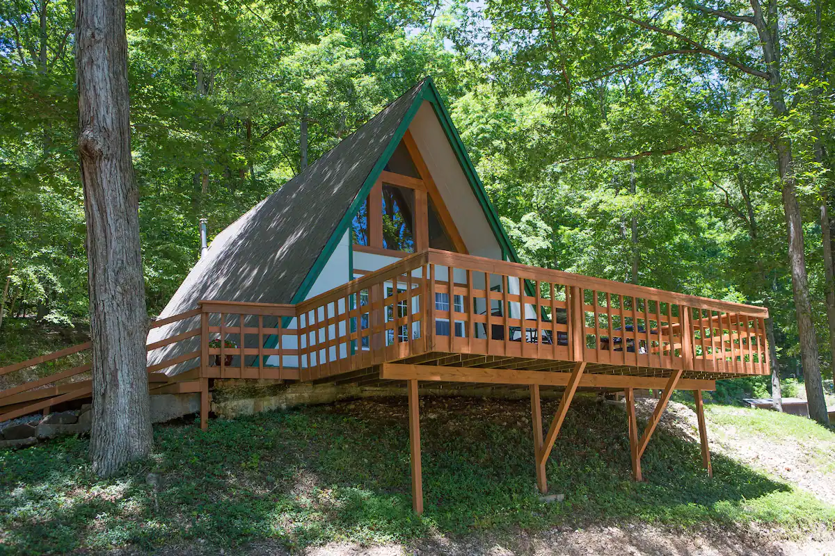 A rustic A-frame on a beautiful property