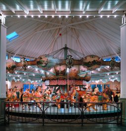 Carousel with painted animals indoors