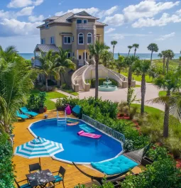 Pool in front of luxury mansion