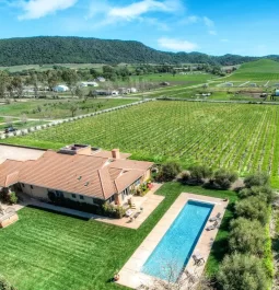 Pool by home and vineyards