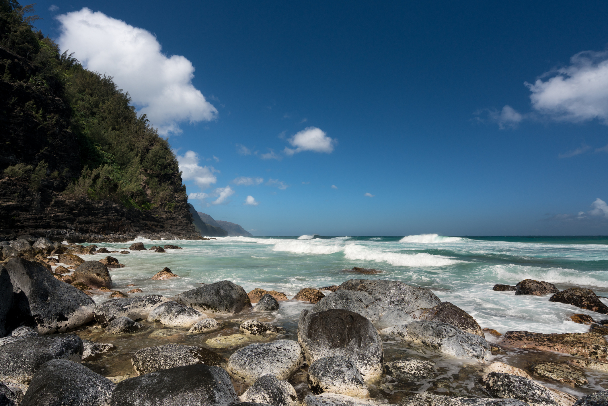 View along the receding headlands of the Na Pali coast from Ke`e Beach