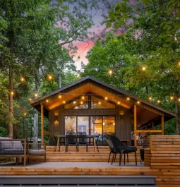 exterior of cabin with string lights