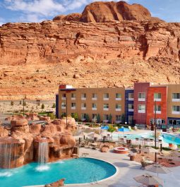 Pool with red rocks in background