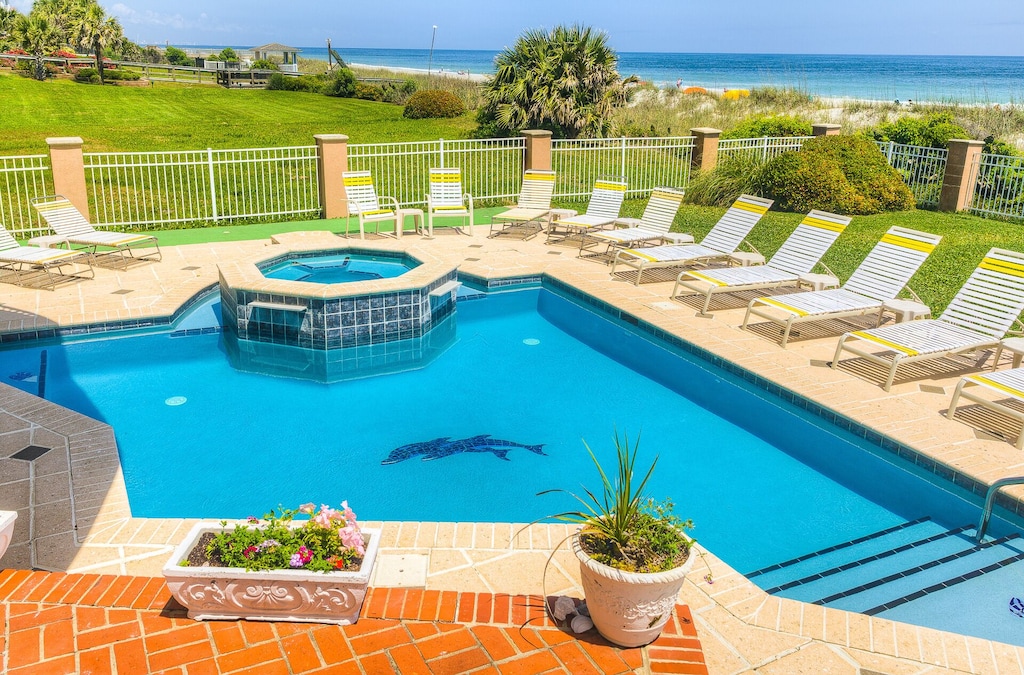 Oceanfront duplex with pool, spa, putting green and walkway to beach