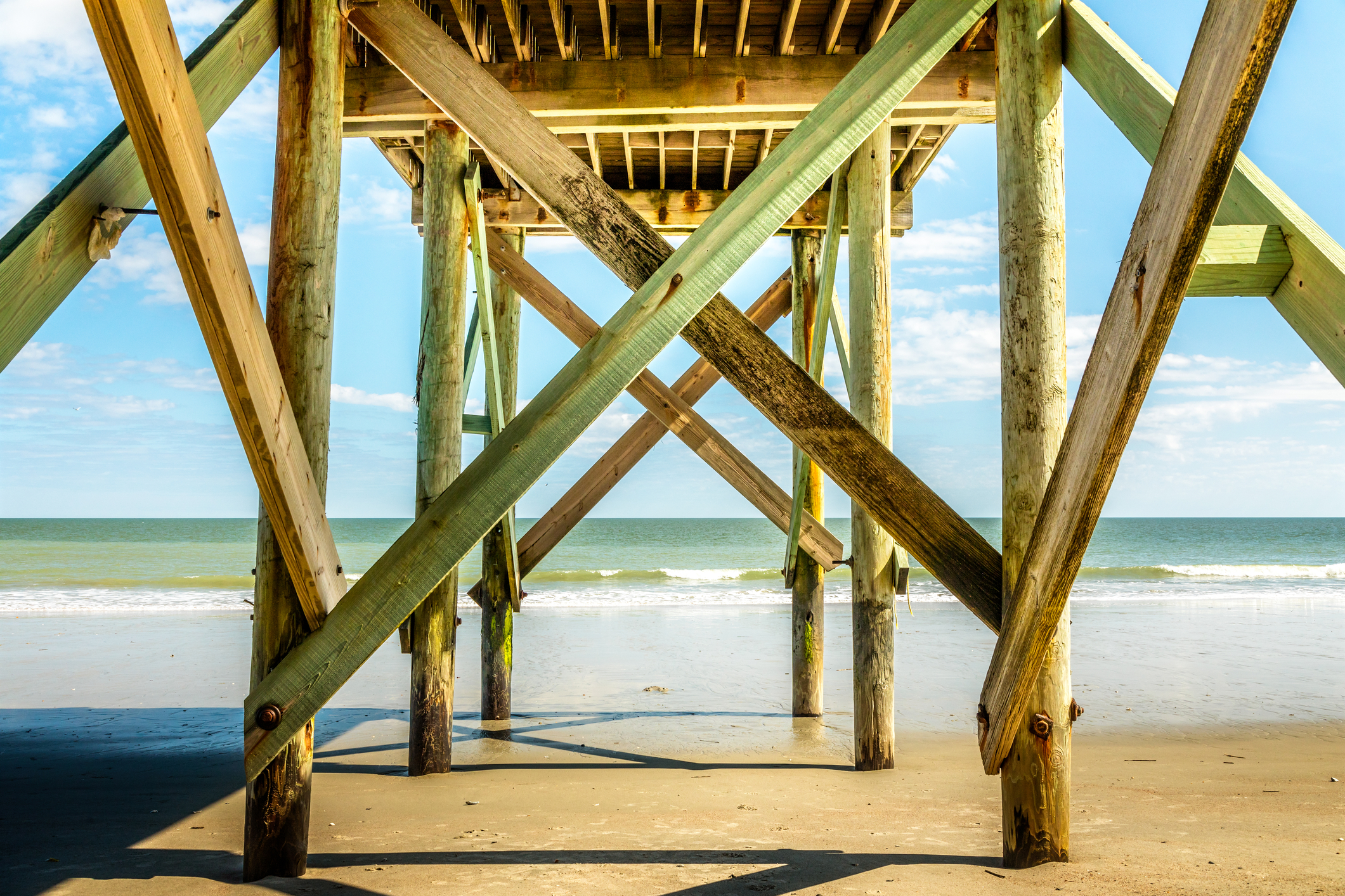 Sandy beach and pier on Edisto Island, South Carolina