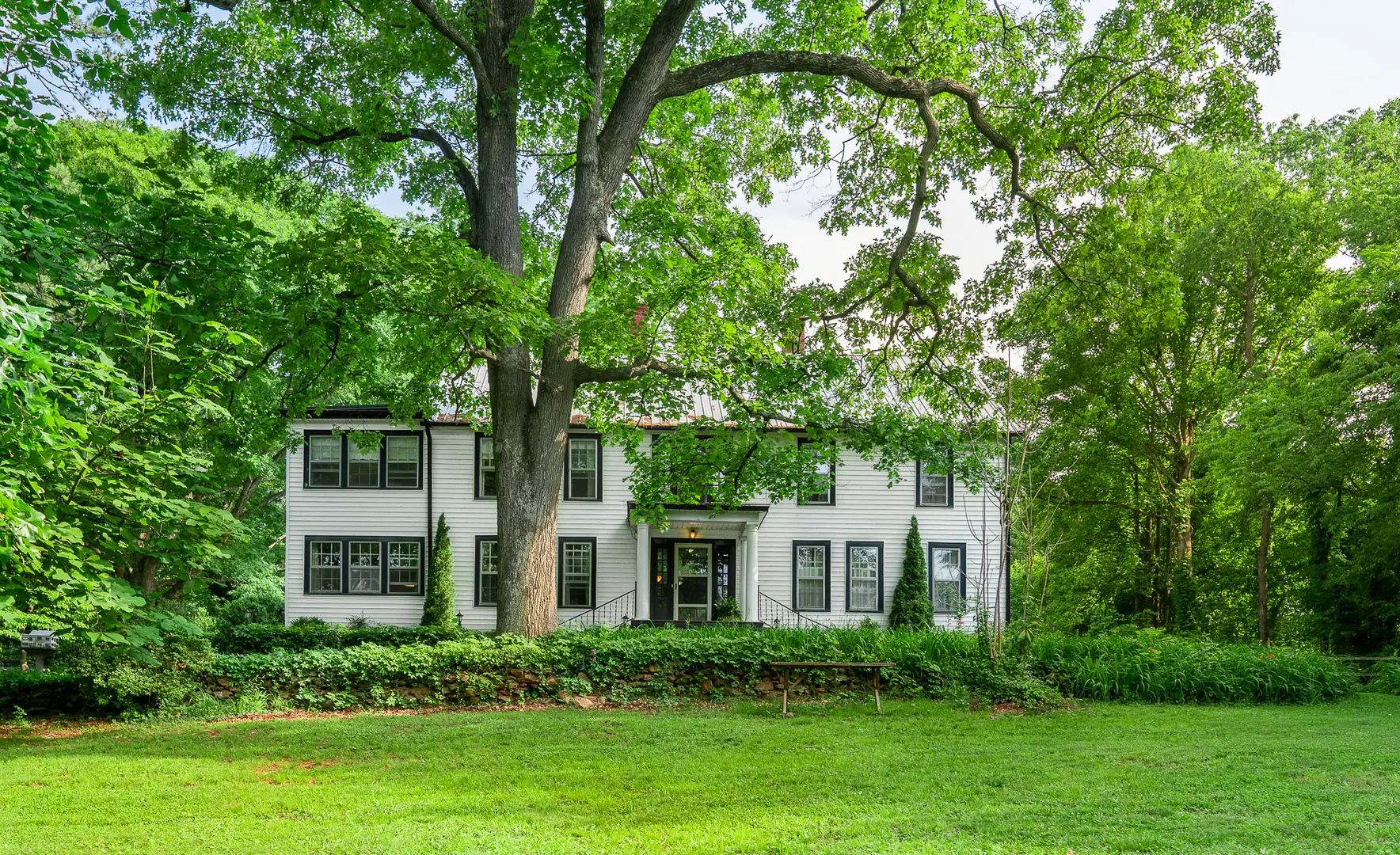 An oasis of comfort and relaxation surrounded by old oak trees