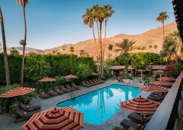 View of a resort swimming pool and the mountains in the background